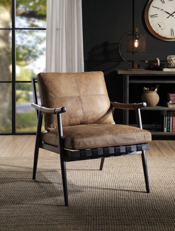 This Berham Chestnut accent chair features luxurious top grain leather, full foam cushioning, and a durable matt iron metal frame for comfort and timeless style